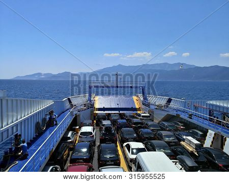 Keramoti, Greece - July 7, 2019 : Cars On Thassos Ii Ferryboat