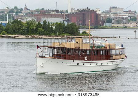 New Bedford, Massachusetts, Usa - August 6, 2019: Motor Yacht Enticer, Hailing Port Newport, Rhode I