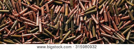 Different Ammo On Wooden Background, Weapon Concept.