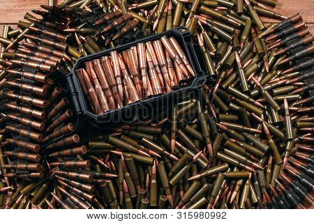 Different Ammo On Wooden Background, Weapon Concept.