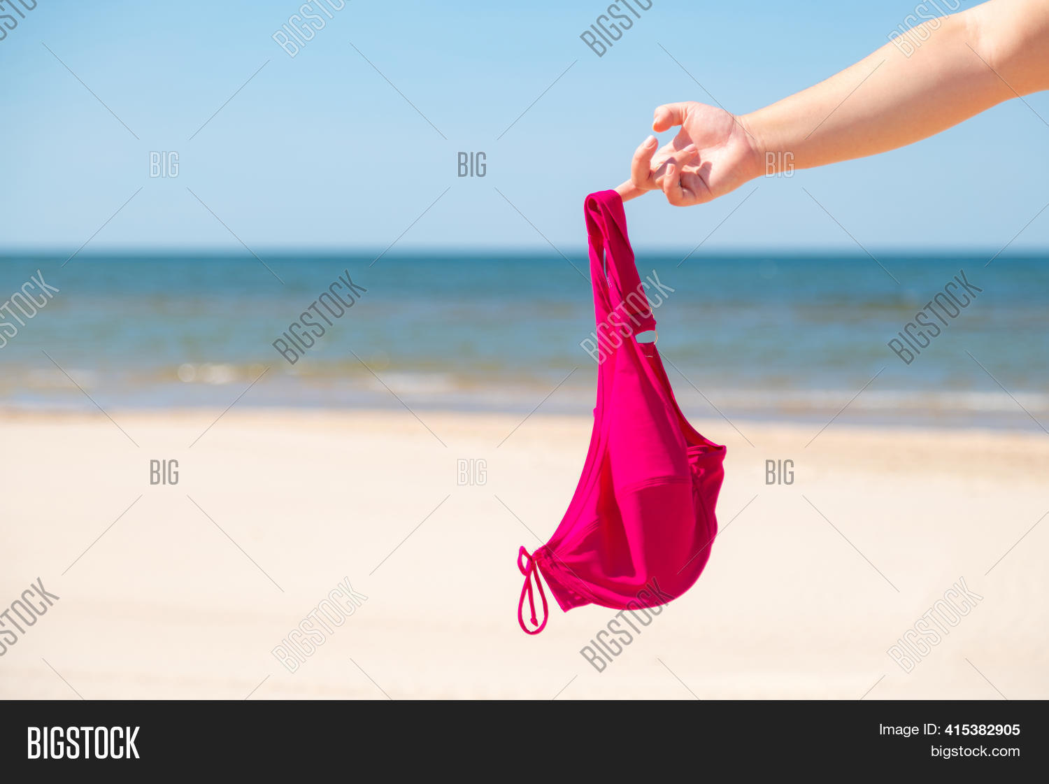 Young Woman Takes Off Bikini Stock Image - Image of shore