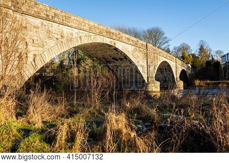 The Arched Ken Bridge Over The Water Of Ken On A Sunny Winters Day, With Frost On The Ground New Gal