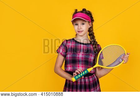 Child Hold Badminton Racket. Kid Tennis Player. Back To School. Happy And Healthy Childhood