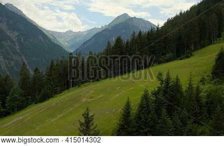 Beautiful Alpine Landscape With Green Meadows, Alpine Cottages And Mountain Peaks, Lechtal, Lech, Au