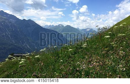 Beautiful Alpine Landscape With Green Meadows, Alpine Cottages And Mountain Peaks, Lechtal, Lech, Au