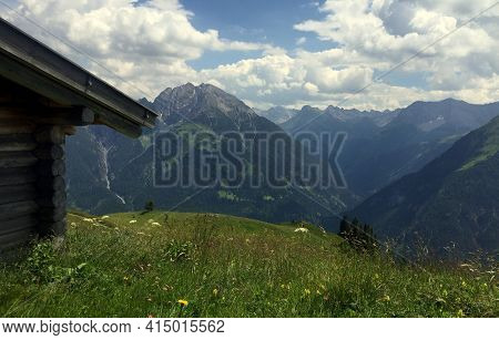 Cabin On A Meadow In The Mountains In Austra