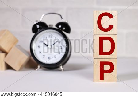 Customer Data Platform. Cdp. Text On Wood Cubes. Text In Black Letters On Wood Blocks