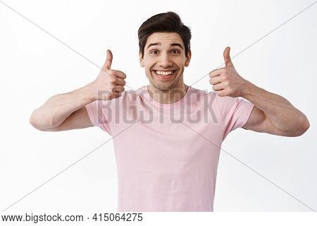 Totally Agree, Very Good. Excited Smiling Man Shows Thumbs Up In Approval, Likes Something Awesome, 