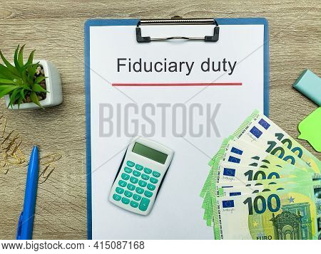 Paper With Text Fiduciary Duty On Wood Table.
