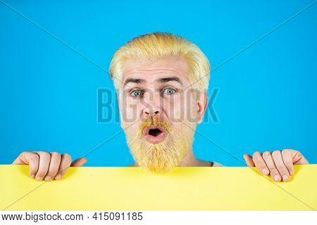 Man Holding Empty Blank Paper Board With Copy Space For Text. Blank, Empty Paper, Billboard With Cop