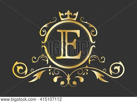 Golden Stylized Letter E Of The Latin Alphabet. Monogram Template With Ornament And Crown For Design