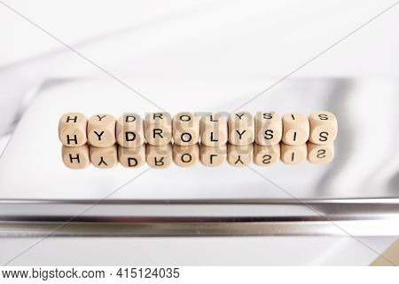 Word Hydrolisis Made By Yellow Wooden Cubes