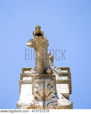 Lime Sandstone Gargoyles At St. Peter\'s Cathedral In Regensburg, Photographed In Spring