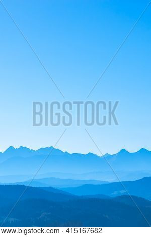 Blue Surreal Mountains Against The Backdrop Of A Cyan Sky, Fantastic Fairytale Mountain Landscape