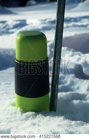 Ski Pole And Thermos In The Snow. Halt. Halt