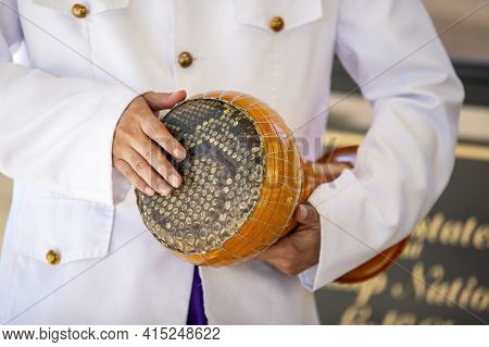 Spike Fiddle, Tro, Being Played By A Musician At A Cambodian Wedding Ceremony