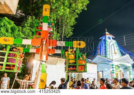 Howrah, West Bengal, India -14th April 2019: Children Are Riding On Nagordola- A Traditional Amuseme