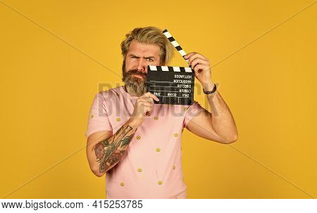 Bearded Guy With Film Making Clapperboard. Movie Time. Film Director Concept. Catch The Feeling. Pro