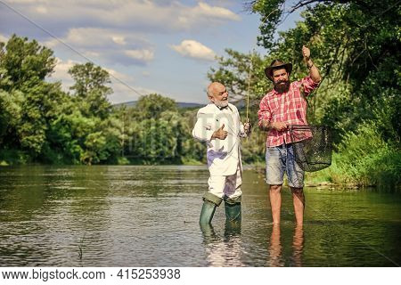 Weekend With Family. Happy Fishermen Friendship. Fly Fish Hobby Of Businessman. Retirement Fishery. 