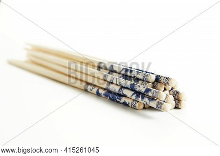 Wooden Chopsticks With Stacked Stack Pattern Isolated On White Background