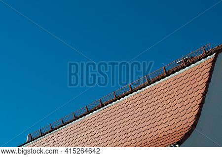 Detail Of The Gambrel Roof Of A Hisoric Building With Beavertail Tiles