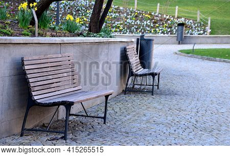 Retaining Wall At The Large Staircase In The Park Is A Flowerbed Area Planted With Rich Greenery Per