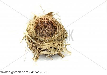 The Bird's Nest Is Laid Bare And Old Abandoned On A White Background, And There Is A Text Area.