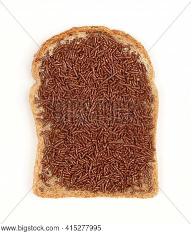 Typical Dutch Chocolate Sprinkles (hagelslag) On A Slice Of Bread, Isolated