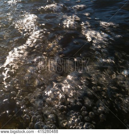 Air Bubbles In Wavy Turbulent Water Stream On Sunshine, Abstract Water Surface