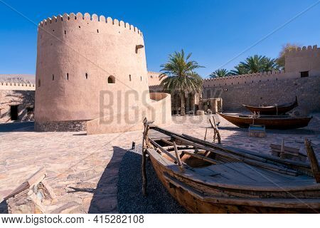 Khasab, Oman - 04.01.2018: Courtyard Of Medieval Arabian Fort In Khasab, Oman. Traditional Wooden Bo