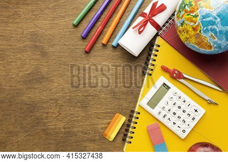 Top View Notebook With School Supplies Copy Space. High Quality And Resolution Beautiful Photo Conce