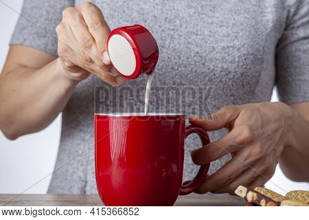 A Tea Time Or Coffee Time Concept With Sandwich Cookies, Bars Of Chocolate Aesthetic Ceramic Mug And