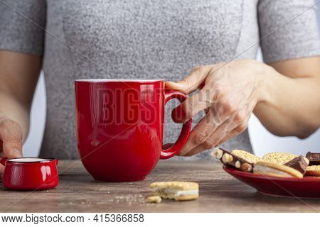 A Tea Time Or Coffee Time Concept With Sandwich Cookies, Bars Of Chocolate Aesthetic Ceramic Mug And