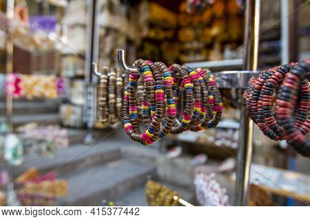 Close Up Image Of Handmade Decorative Beads On A String Type Wrist Bands On Display At A Local Gift 