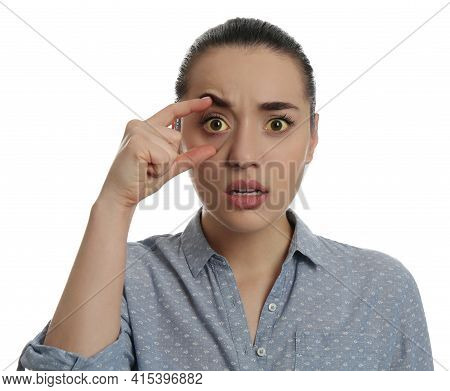 Woman Checking Her Health Condition On White Background. Yellow Eyes As Symptom Of Problems With Liv