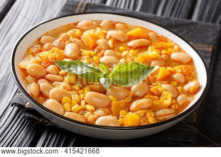 Vegetarian Porotos Granados Bean Stew With Corn, Pumpkin And Onions Close-up In A Bowl On The Table.