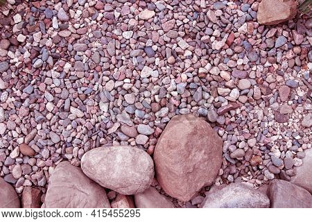 Big Round Stones And Small Pebbles Of Different Shape And In Different Shades Of Pink Color As A Bac