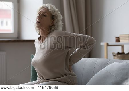 Frustrated Senior Woman Suffering From Rheumatism, Radiculitis