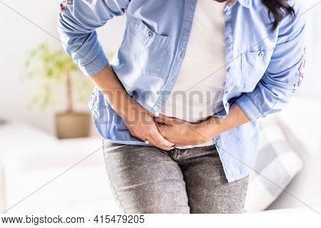 Detail Of A Woman In Pain Of Abdominals,

Gallbladder, Ovaries, Appendix, Liver Or Intestines Holdin