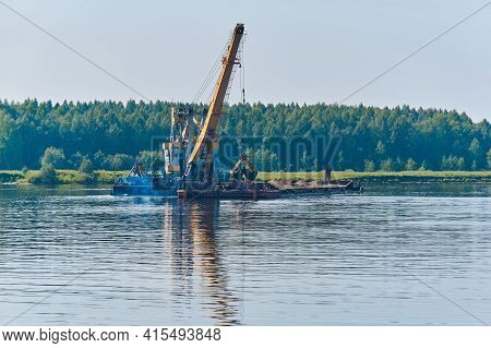 Dredging Boat Is Working To Deepen The Fairway On The River