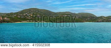 A Panoramic View Of St Thomas With The Turquoise Colored Water.