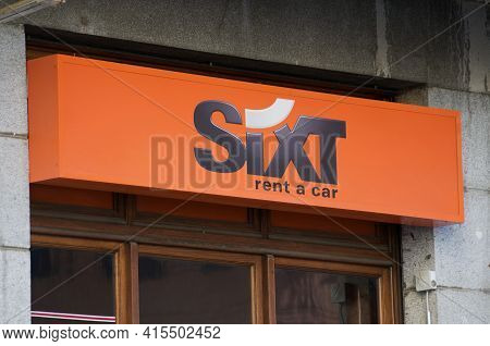 Paradiso, Ticino, Switzerland - 16th March 2021 : Sixt Rental Company Sign Hanging On A Store In Lug