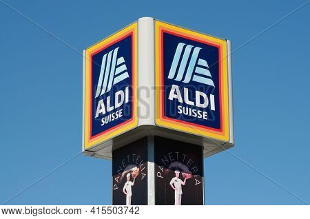 Giubiasco, Switzerland - 20th March 2021 : Aldi Suisse Sign Hanging On The Top Of A Store In Giubias