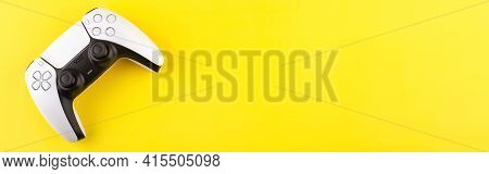 Next Gen  Videogame Console Wireless Wireless Gamepad. Yellow Background. Minimal Style. Modern Leis
