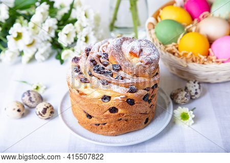 Craffin (cruffin) With Raisins And Candied Fruits. Easter Bread Kulich And Painted Eggs. Easter Holi