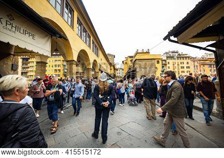 October 11, 2018.tuscany.italy.florence: Police And Tourists On The Ponte Vecchio Bridge