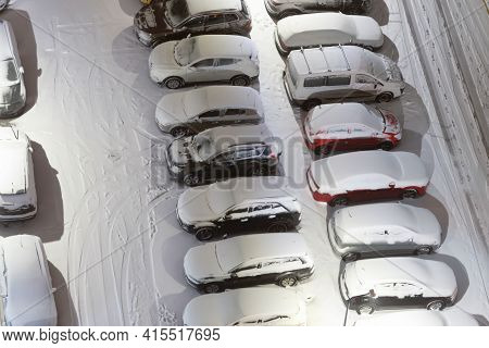 Cars On Night Winter Parking Lots