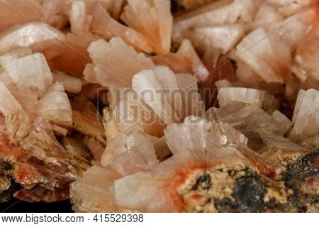 Macro Of A Stone Stilbite Mineral On A Black Background