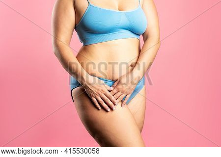 Fat Woman In Blue Underwear On Pink Background, Overweight Female Body