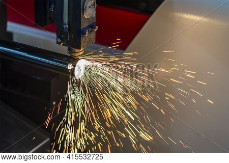 The Fiber Laser Cutting Machine Cutting The Stainless Steel Tube Control By Cnc Program. The Sheet M